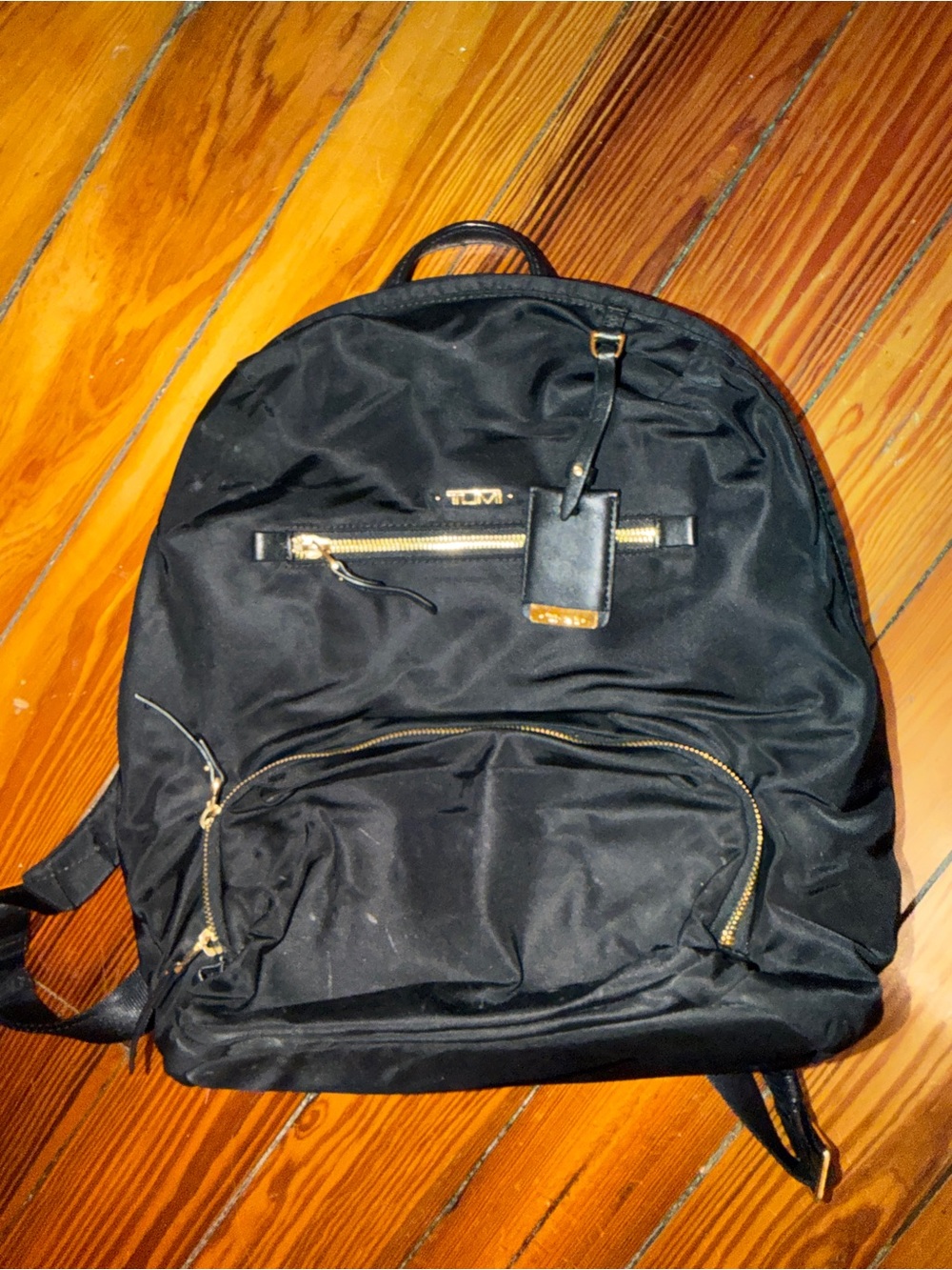 Tumi Black Nylon Backpack with Gold-Tone Accents